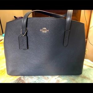 Coach. The Charlie Carryall. Polished pebble leather. Like new. Hardly used